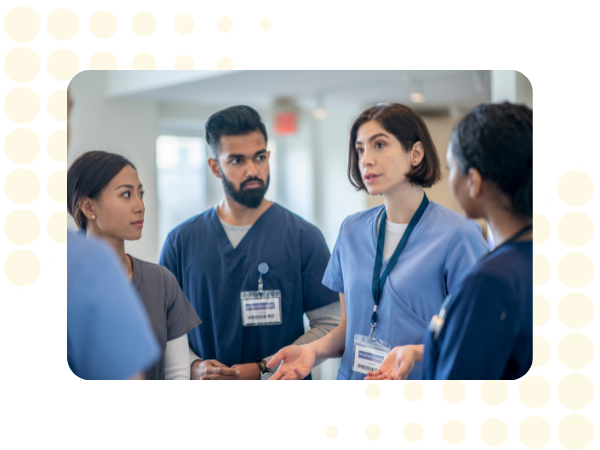 A group of nurses and doctors talking to each other